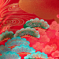 detail of kimono pillow green pine over red silk base