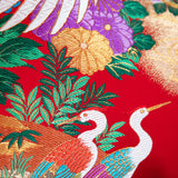 detail of flowers and birds from an obi pillow by hunted and stuffed