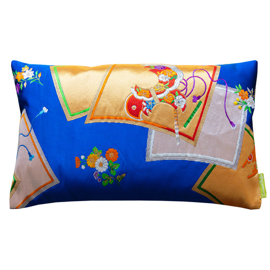 Electric blue silk pillow with gold accents made from vintage obi silk.