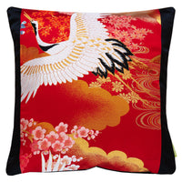 Flying cranes cushion in red silk with black velvet back by Hunted and Stuffed