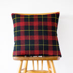 Close-up of navy wool tartan pattern highlighting the textured fabric weave and subtle vintage Gannex Ltd Ed Harold branding