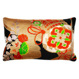 Gold and black obi cushion with taiko drum design by Hunted and Stuffed