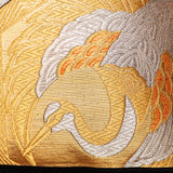 Golden phoenix pillow with silver accents