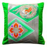 Green oriental silk cushion with phoenix and flowers.