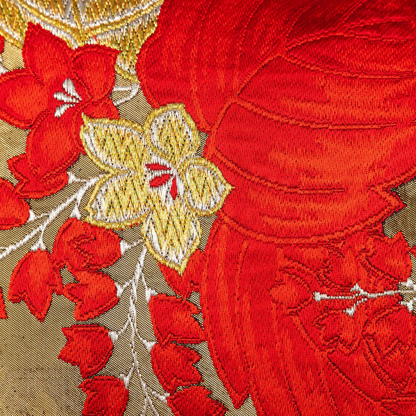 Vintage obi pillow with kiri paulownia flowers and leaves in red and gold embroidery