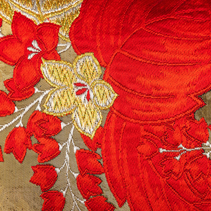 Vintage obi pillow with kiri paulownia flowers and leaves in red and gold embroidery