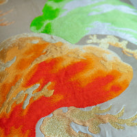 Detail of orange silk matsu pine vintage obi pillow.