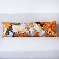 Oriental Bolster Cushion - flying cranes on gold