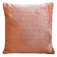 View of the pillow reverse in plain peach corded velvet.