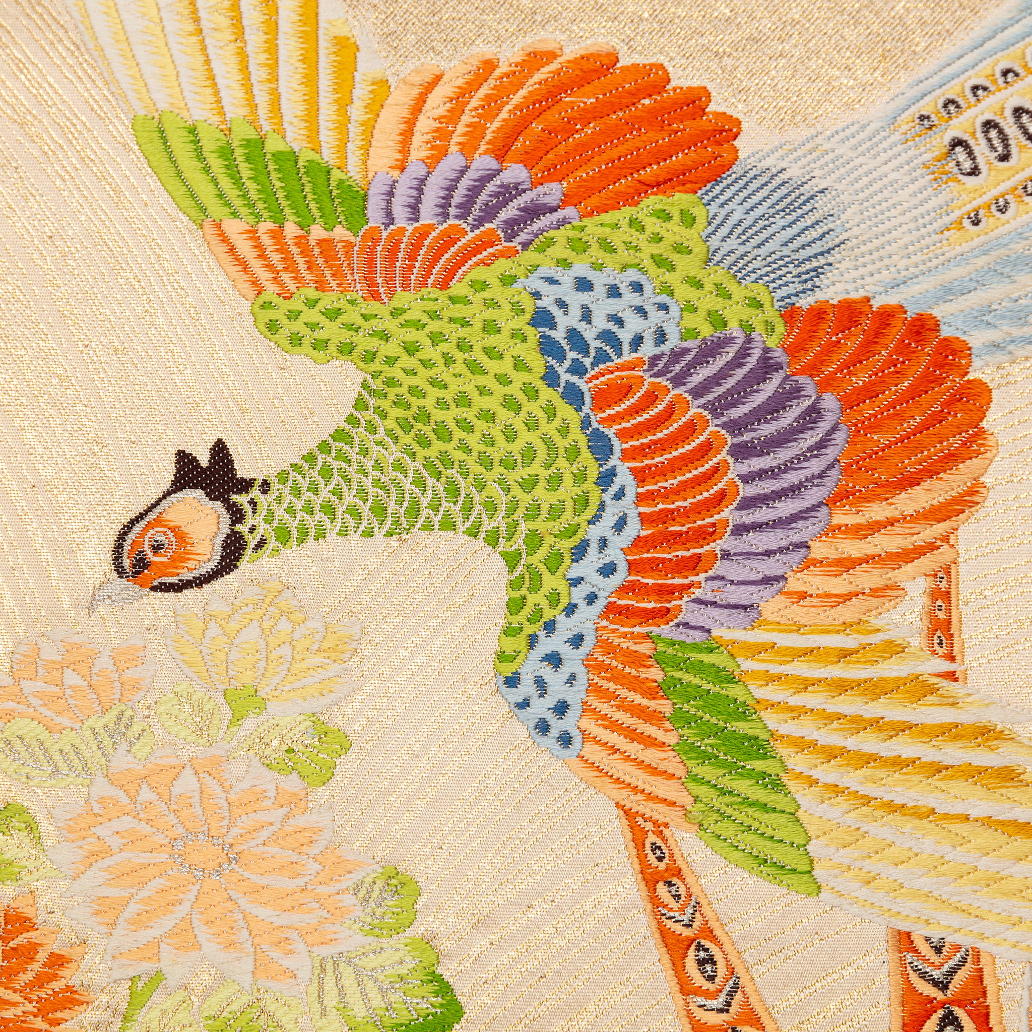 Close-up of cream Maru Obi silk and duck egg blue velvet fabric detail on the Flying Pheasants Pillow, highlighting textured