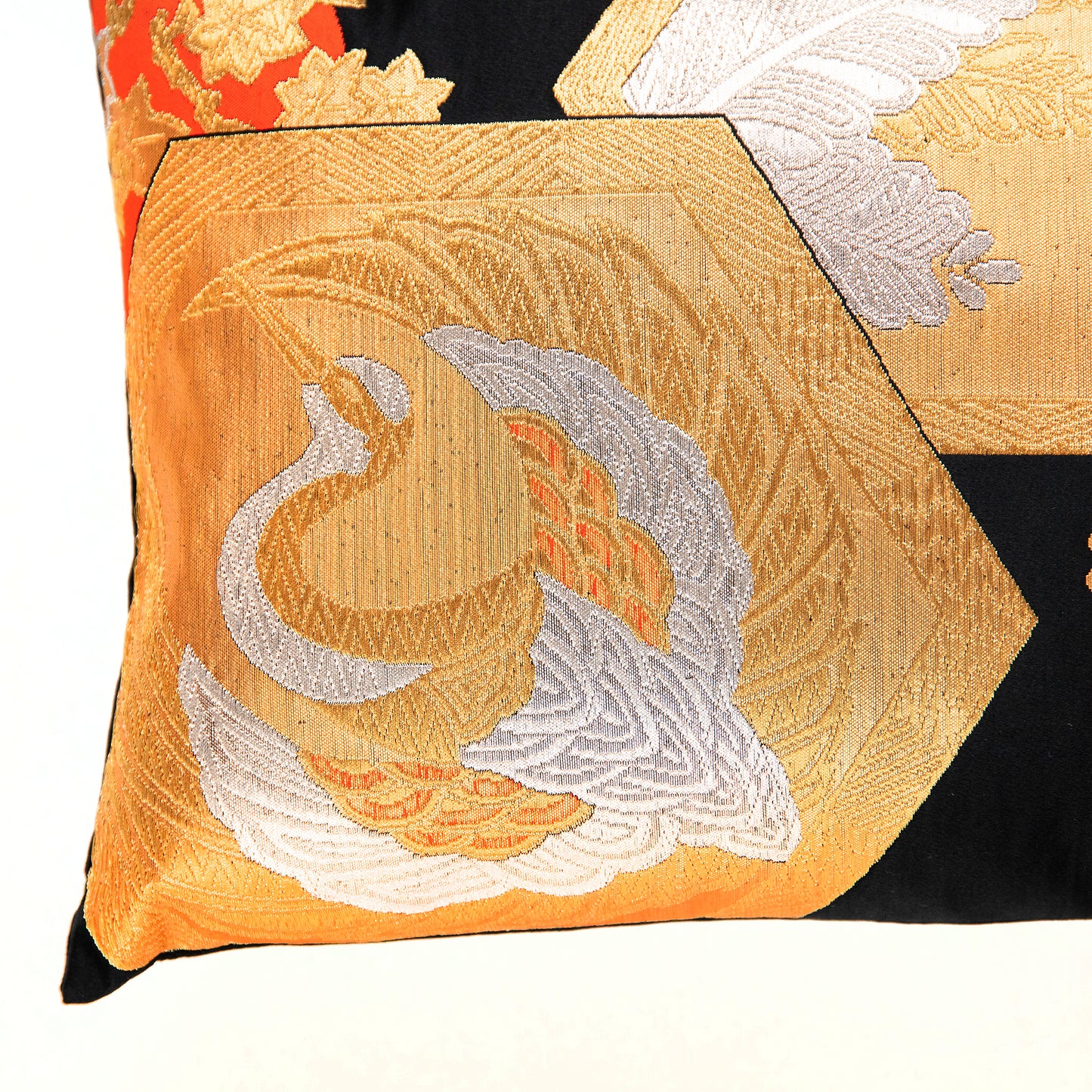 Corner of phoenix pillow by Hunted and Stuffed