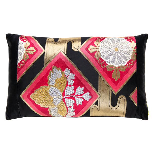 Pink kimono pillow on black silk with gold accents