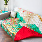 Close-up of intricate gold phoenix embroidery on silk quilt edge, highlighting vintage wedding kimono-inspired detail and