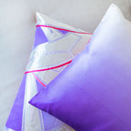 Close-up of the purple-to-white ombre silk texture highlighting subtle color transitions and delicate fabric weave details.